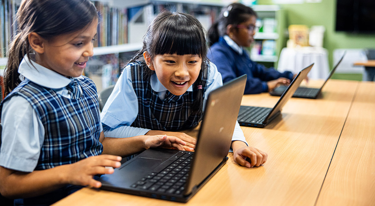 Holy Trinity Catholic Primary School Granville students learning on laptop