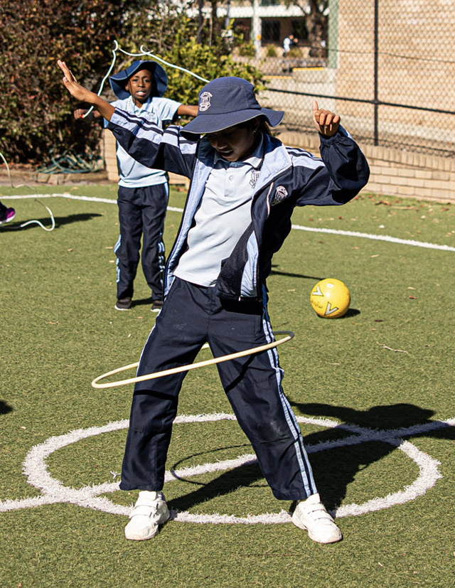 Holy Trinity Catholic Primary School Granville student using a hoola hoop