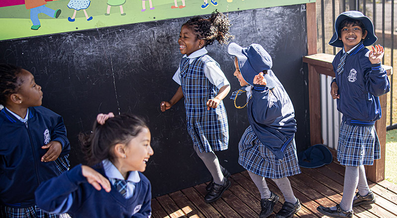 Holy Trinity Catholic Primary School Granville students playing in cubby house