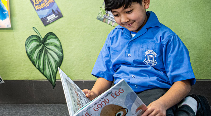 Holy Trinity Catholic Primary School Granville student reading books