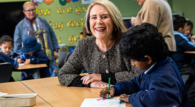 Holy Trinity Catholic Primary School Granville dedicated principal Shauna Nash smiling at student