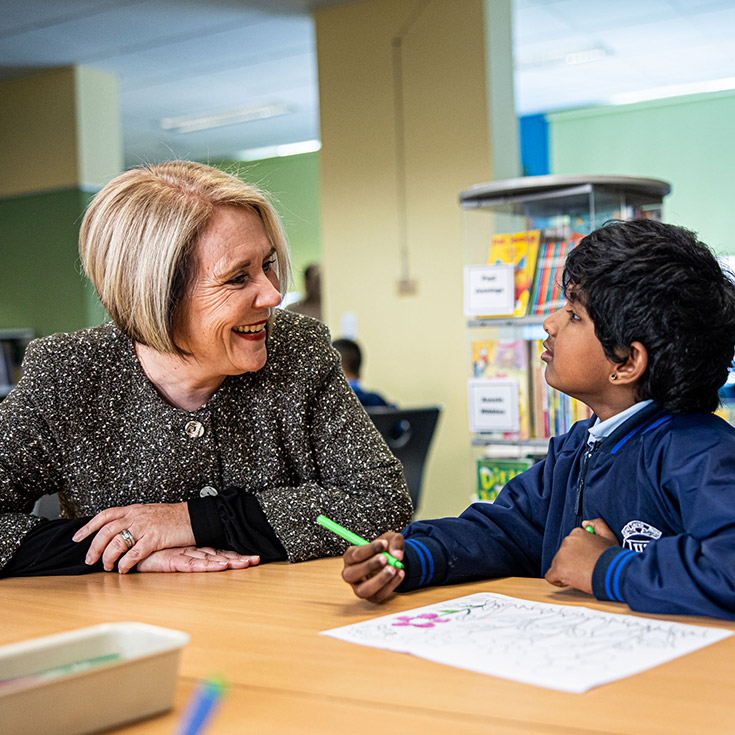 Holy Trinity Catholic Primary School Granville dedicated principal Shauna Nash smiling at student