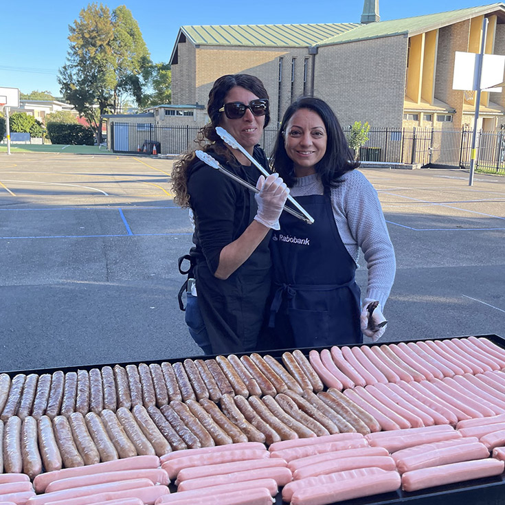 Holy Trinity Catholic Primary School Granville dedicated parents grilling on BBQ
