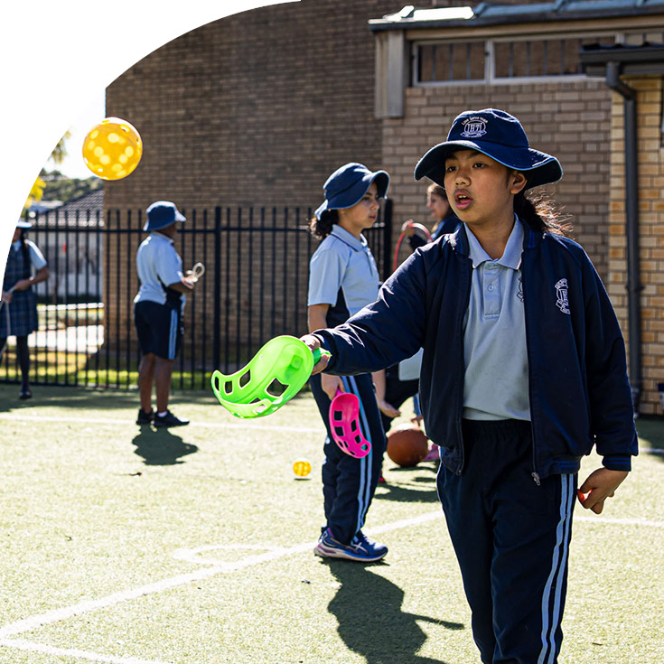 Holy Trinity Catholic Primary School Granville student playing in playground