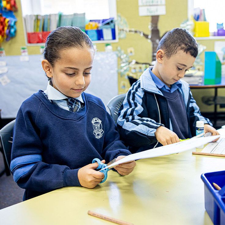 Holy Trinity Catholic Primary School Granville students cutting paper