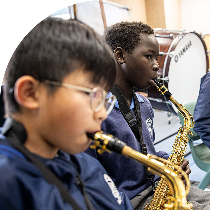 Holy Trinity Catholic Primary School Granville students learning instruments