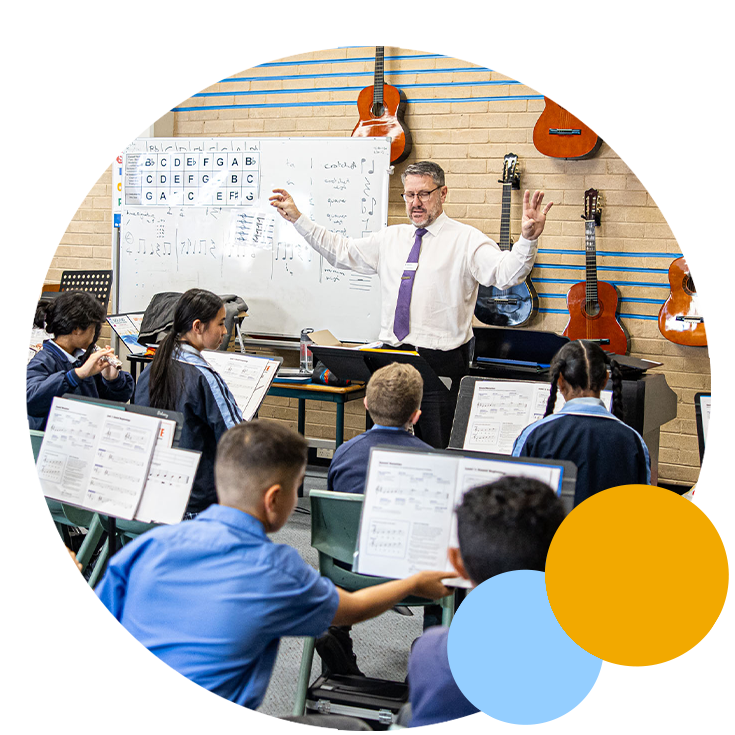 Holy Trinity Catholic Primary School Granville dedicated teacher and students learning instruments